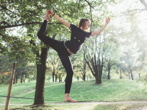 Woman balancing a tightrope